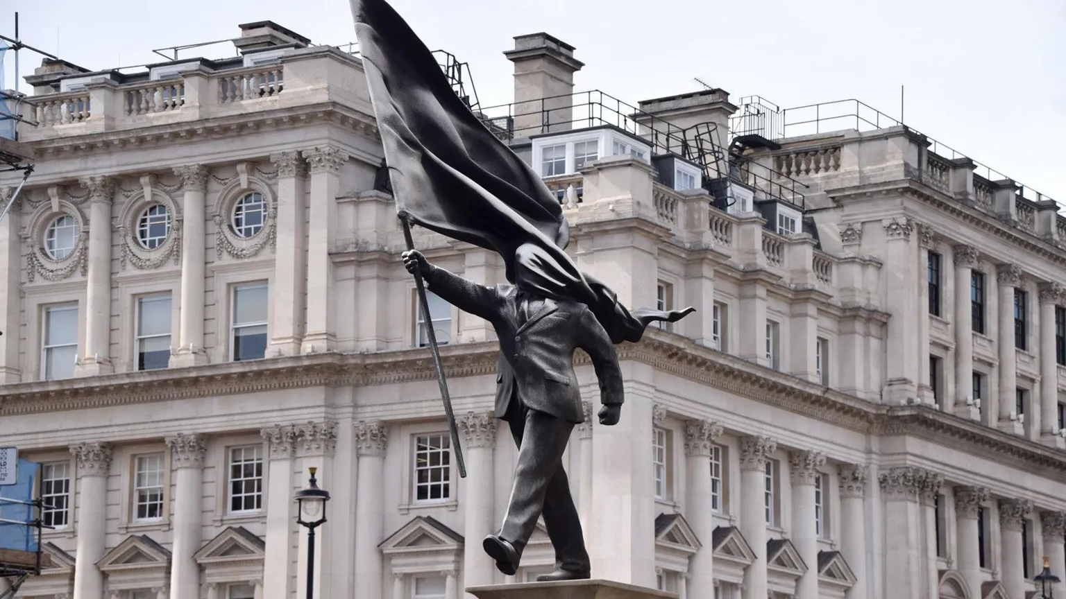 Banksy blinded by flag statue